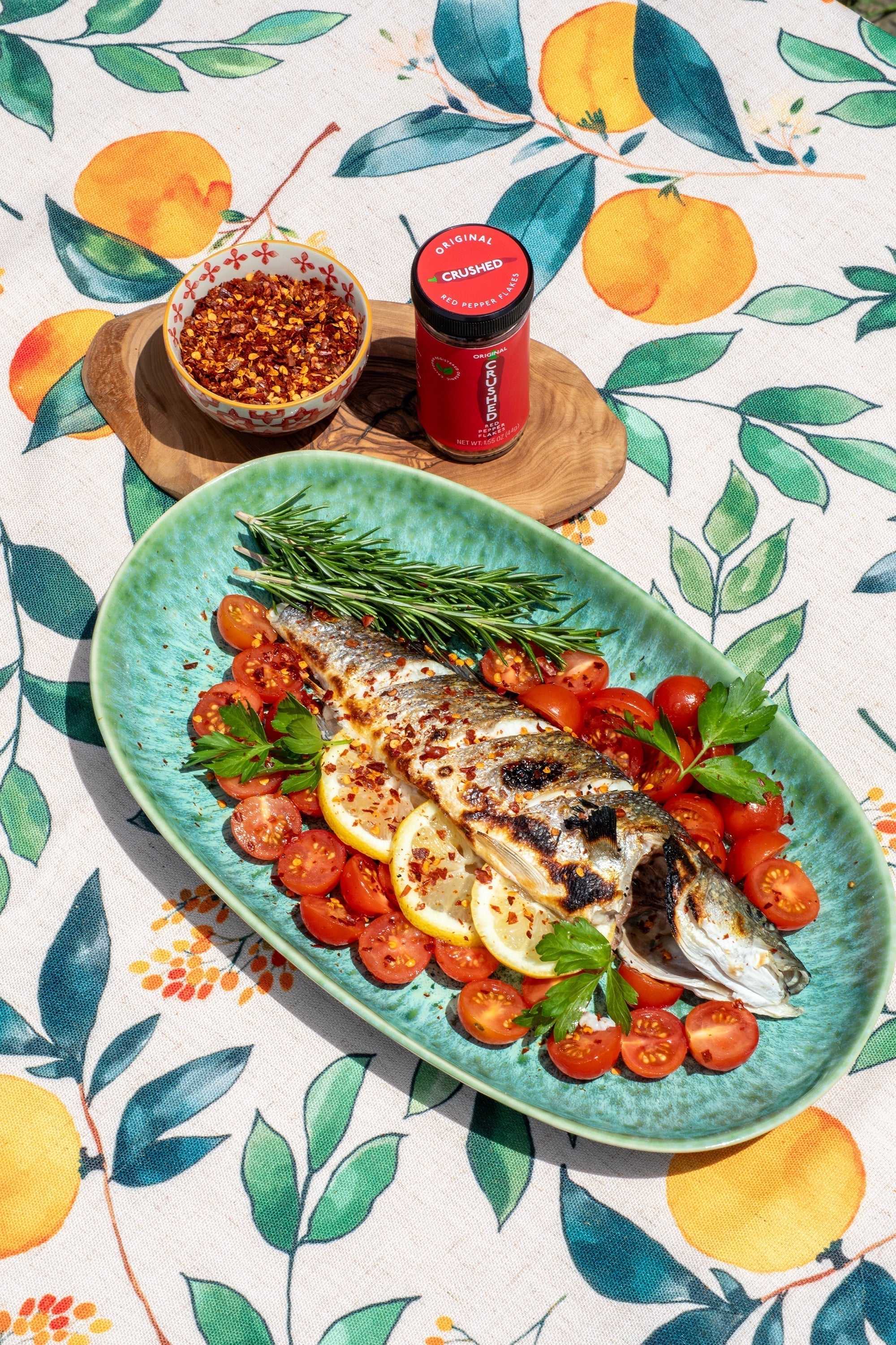 Roasted Branzino with Cherry Tomatoes, Lemon, Rosemary and Original Crushed Red Pepper