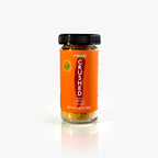 Jar of Cheddar Crushed Red Pepper on a white backgound